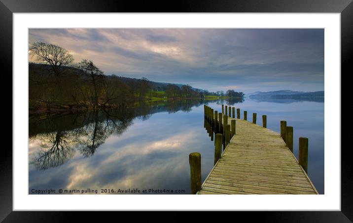 Calm before the storm on Coniston lake  Framed Mounted Print by martin pulling