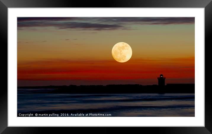 Fire in a Burry Port sky Framed Mounted Print by martin pulling