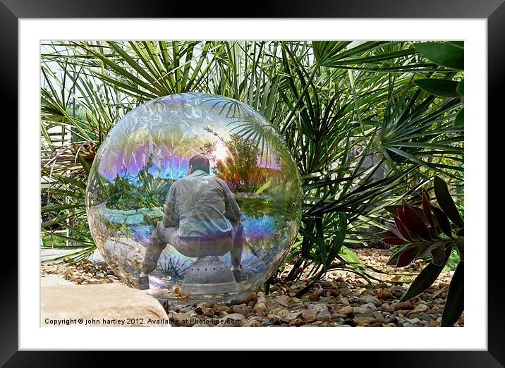 Man in a Glass Ball (composite) Framed Mounted Print by john hartley