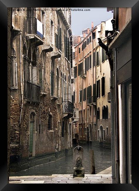 Inside Venice - Tall buildings dwarf a Venetian Ca Framed Print by john hartley