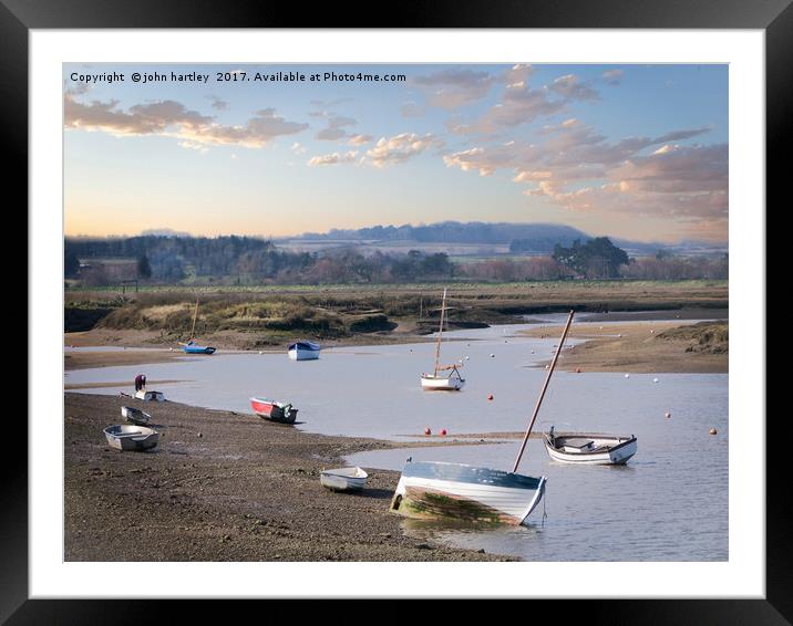 Sunset over an ebbing tide at Burnham Overy Staith Framed Mounted Print by john hartley