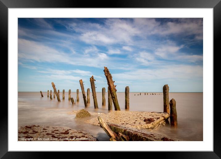 Groynes on the shore Framed Mounted Print by kevin cook