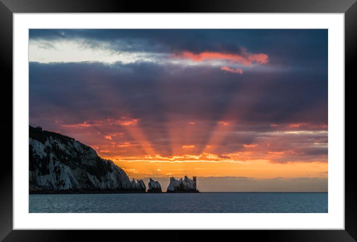 Red starburst sunset behind the Needles rocks Framed Mounted Print by Alf Damp