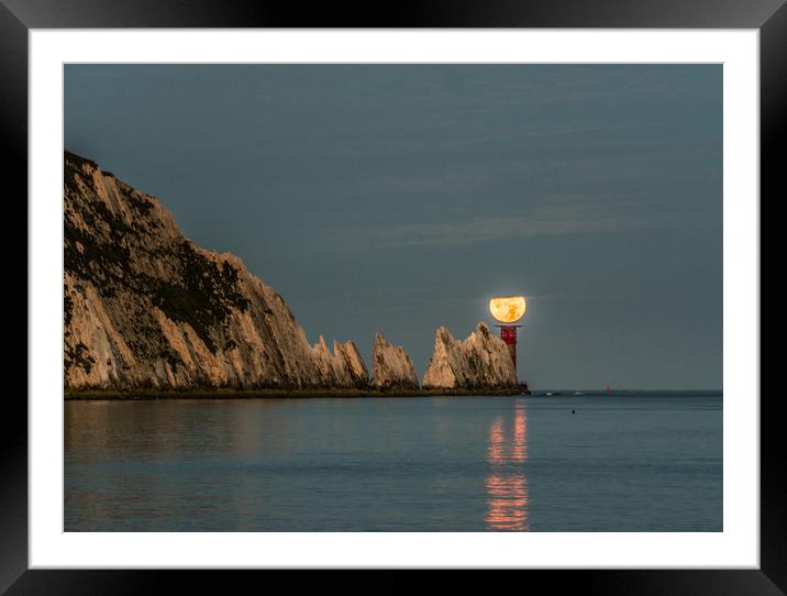 Moon setting over lighthouse Framed Mounted Print by Alf Damp
