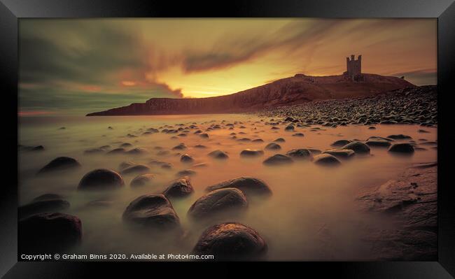 Dunstanburgh Castle Sunrise Framed Print by Graham Binns