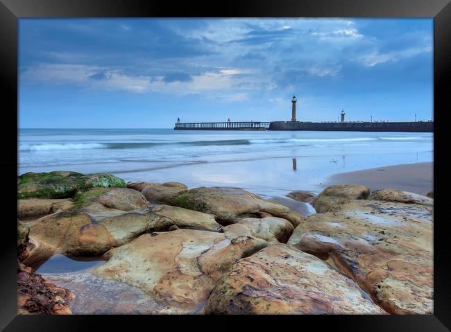 Whitby pier from the North Beach Framed Print by John Hall