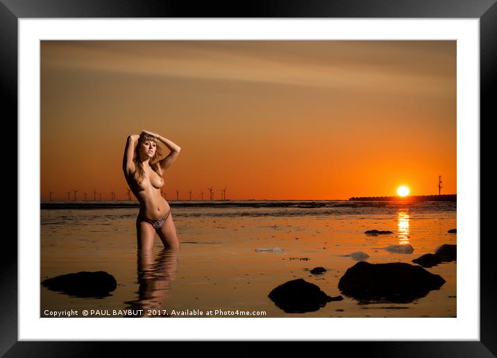 Topless young woman at sunset standing in the sea Framed Mounted Print by PAUL BAYBUT