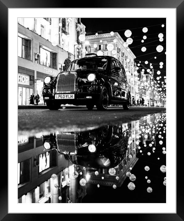 Taxi on Oxford Street Framed Mounted Print by Jon Raffoul