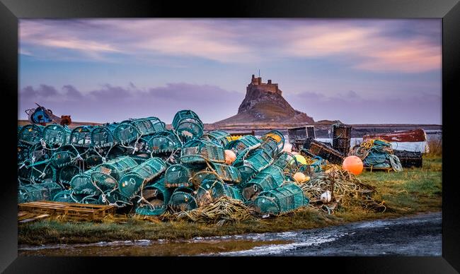 Lindisfarne Castle and Fishing Creels Framed Print by John Frid