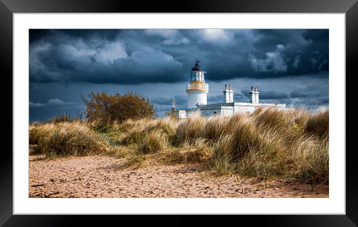 Storm Clouds gather over Chanonry Point Lighthouse Framed Mounted Print by John Frid
