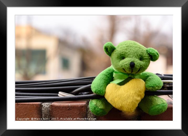 Teddy bear leaning on a wall Framed Mounted Print by Marco Bicci
