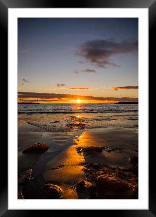 Sun setting over the sea Framed Mounted Print by Alan Jackson