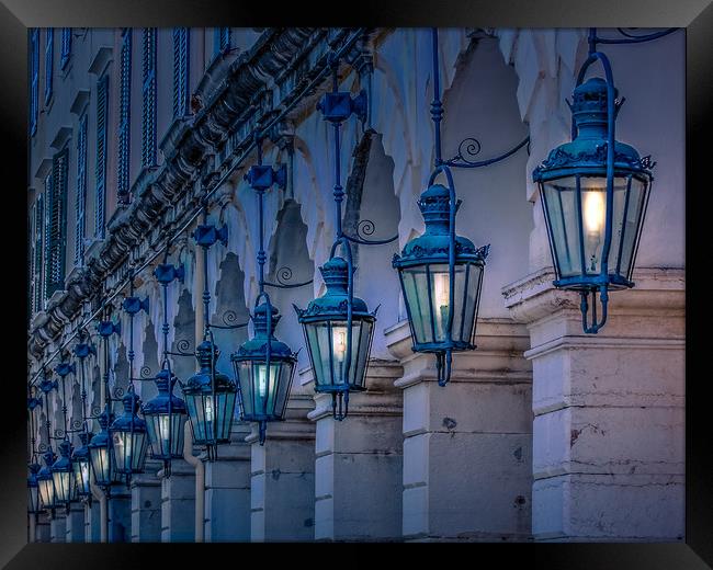 Arches and Lamps in Greece Framed Print by Darryl Brooks
