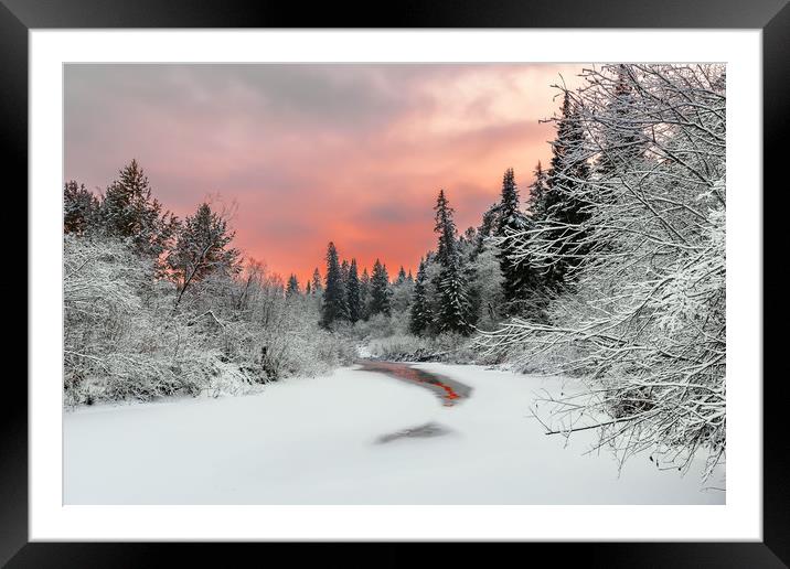 Evening sky over a frozen forest river Framed Mounted Print by Dobrydnev Sergei