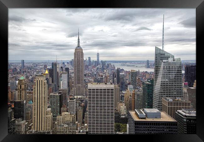 Manhattan and the Empire State Building Framed Print by Jon Jones