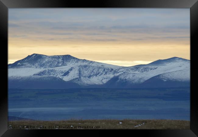 snow capped mountains Framed Print by Tim Clarke