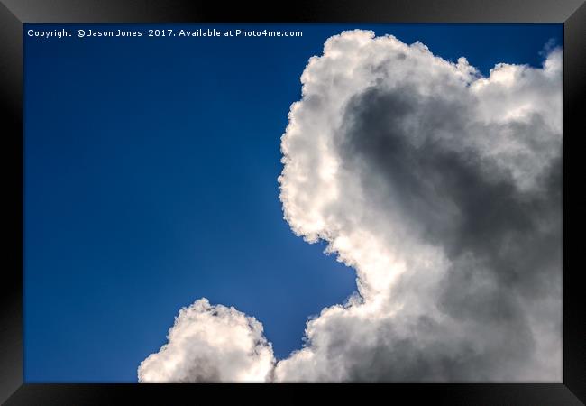 Dramatic Clouds in Blue Sky Framed Print by Jason Jones