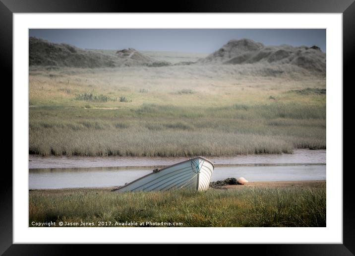 Old wood boat parked alone on the sand  Framed Mounted Print by Jason Jones
