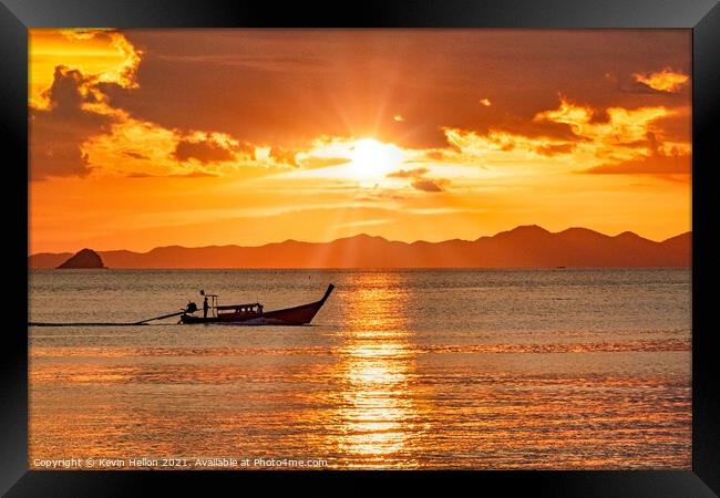 Long tail boat on the Andaman Sea at sunset  Framed Print by Kevin Hellon