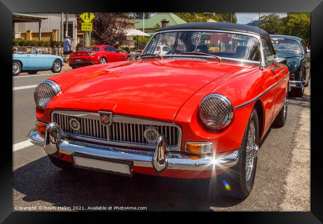 Classic red MGB roadster sports car Framed Print by Kevin Hellon