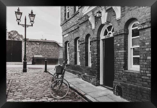 Bicycle in Church Street, Windsor Framed Print by Kevin Hellon