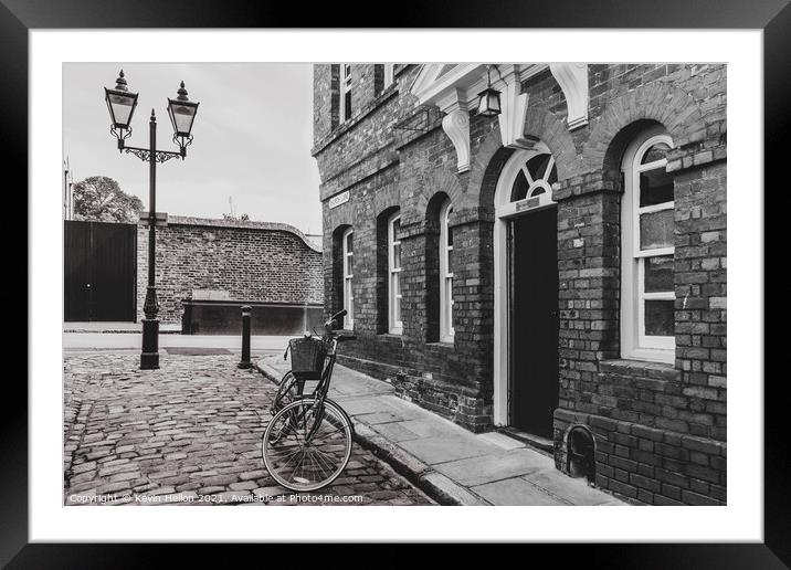 Bicycle in Church Street, Windsor Framed Mounted Print by Kevin Hellon