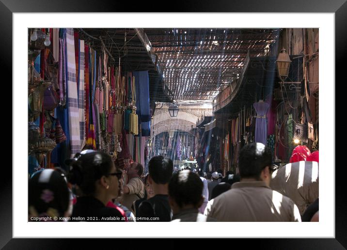 A busy souk  Framed Mounted Print by Kevin Hellon