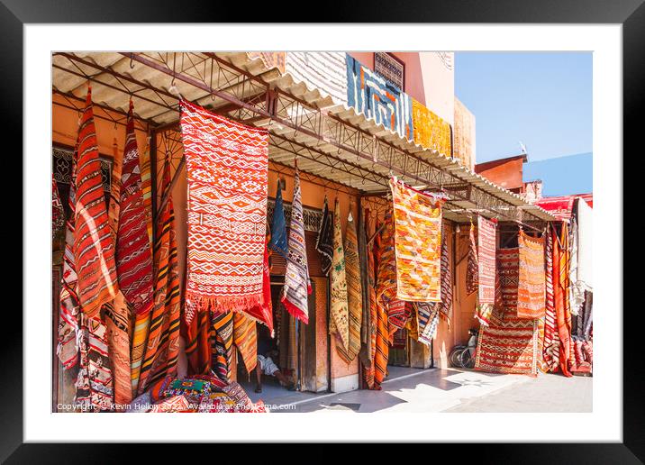 Carpets hanging outside a shop Framed Mounted Print by Kevin Hellon