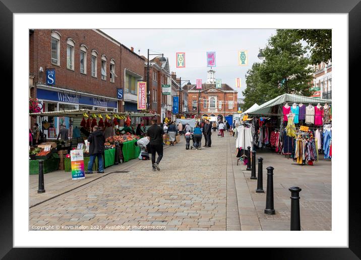 Shoppers on market day. Framed Mounted Print by Kevin Hellon