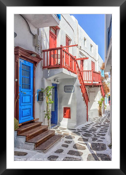 Typical street on the island of Mykonos, Greece Framed Mounted Print by Kevin Hellon