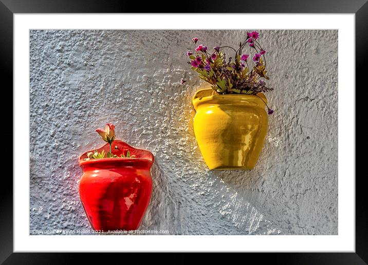 Colourful plantpots with flowers hanging on a wall, Framed Mounted Print by Kevin Hellon