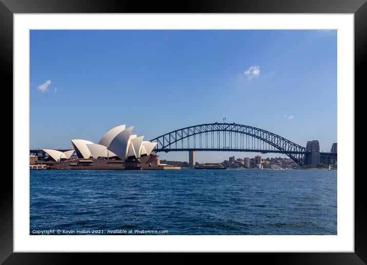 View of the Opera House in Sydney Harbor. The Sydney Harbour Bri Framed Mounted Print by Kevin Hellon