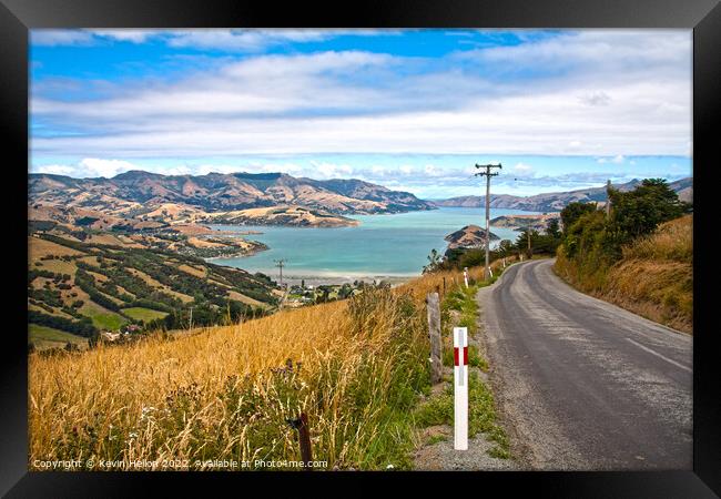 Road through the grasslands and hills of Akaroa Framed Print by Kevin Hellon