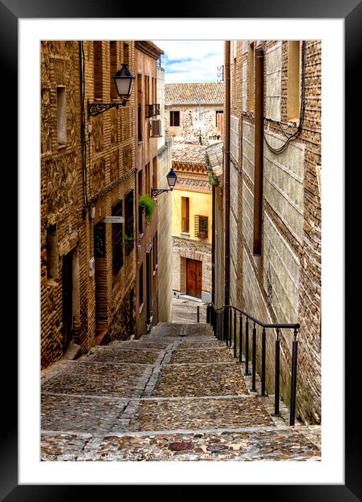 Steep, narrow street in Toledo, Spain Framed Mounted Print by Kevin Hellon