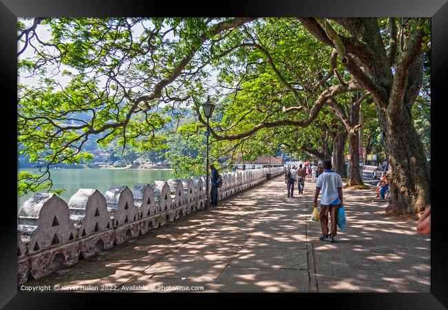 Promenade and lake, Kandy Framed Print by Kevin Hellon