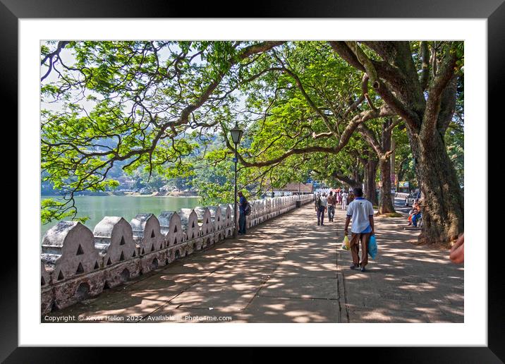 Promenade and lake, Kandy Framed Mounted Print by Kevin Hellon