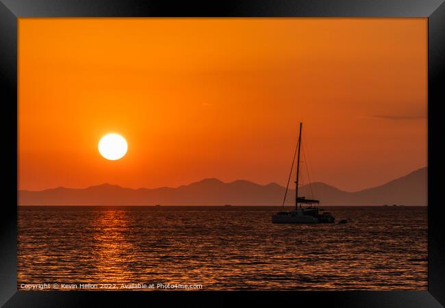 Catamaran moored in Krabi at sunset Framed Print by Kevin Hellon