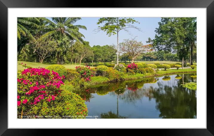 Lake and flowers, Dynasty golf course, Nakhon Pathom, Thailand Framed Mounted Print by Kevin Hellon