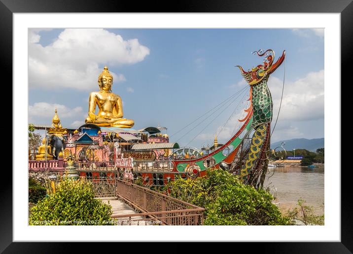 Buddah statue on boat on the Mekhong River  Framed Mounted Print by Kevin Hellon