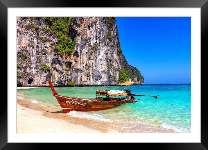 Traditional long tail fishing boat beached on Koh Lao Liang, Tra Framed Mounted Print by Kevin Hellon
