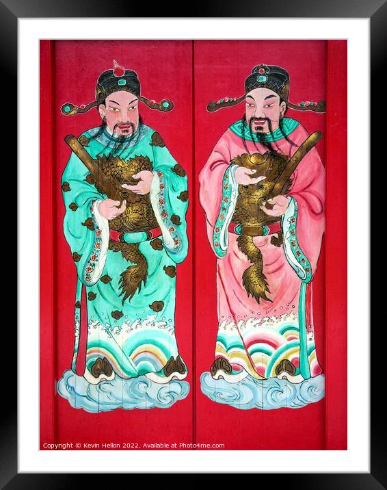 Chinese figures on temple door  Framed Mounted Print by Kevin Hellon