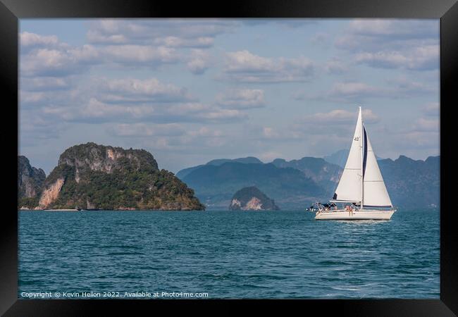 Yacht sailing in Phang Nga Bay, Phuket, Thailand Framed Print by Kevin Hellon