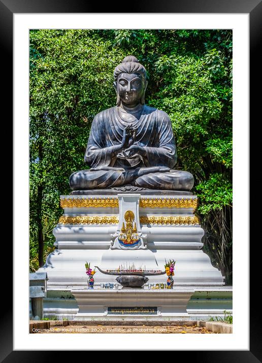 Buddha Statue and Thai flag,  Framed Mounted Print by Kevin Hellon