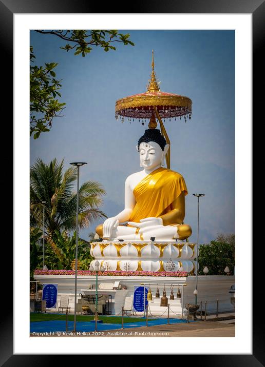 Buddha statue and Thai flag,  Framed Mounted Print by Kevin Hellon