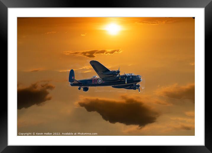 Lncaster bomber in flight at sunset Framed Mounted Print by Kevin Hellon