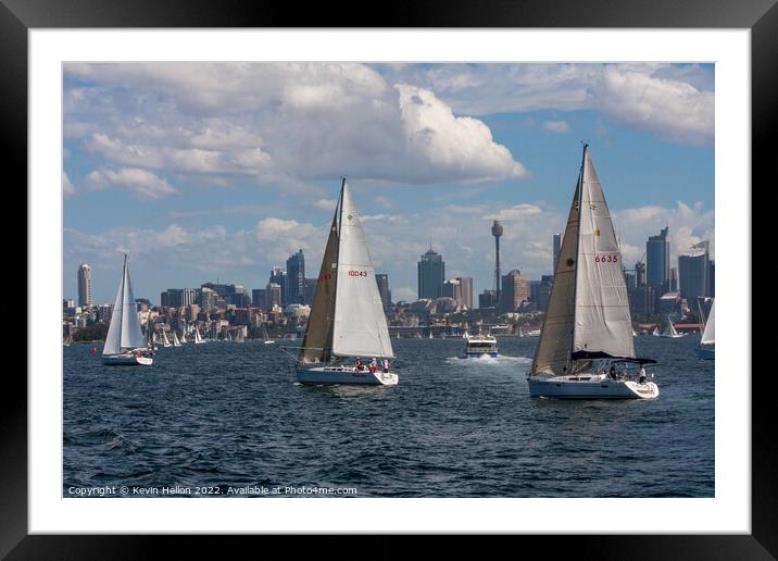Yachts sailing in Sydney harbour witheCentral Business District, Framed Mounted Print by Kevin Hellon
