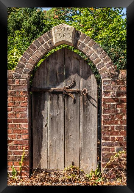 Old wooden gate with wrought iron fittings  Framed Print by Kevin Hellon