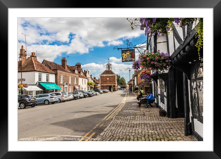 The King's Arms Hotel and High Street, Framed Mounted Print by Kevin Hellon