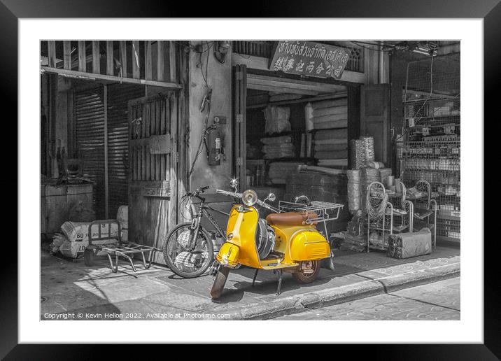 Yellow scooter, Bangkok Framed Mounted Print by Kevin Hellon