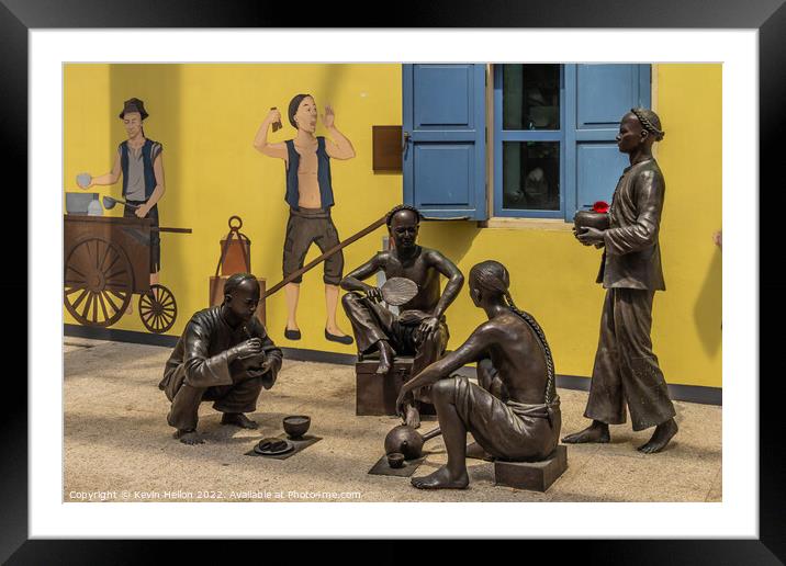 Bronze statues and wall mural, Singapore Framed Mounted Print by Kevin Hellon